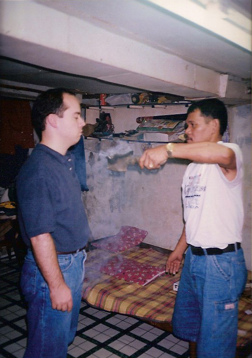 Gregorio Baet works on Mark Wiley
