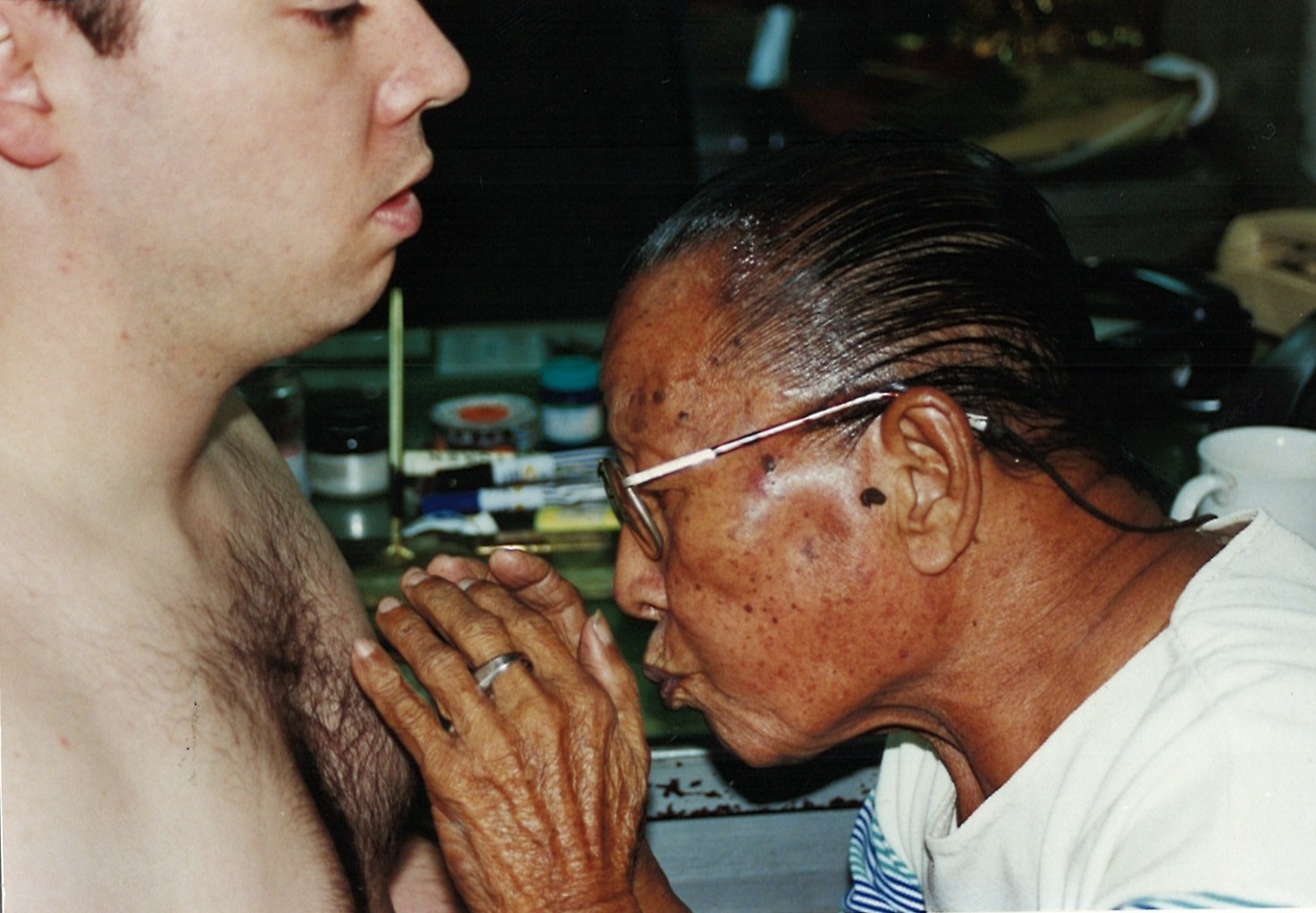 Jose Mena works on Mark Wiley