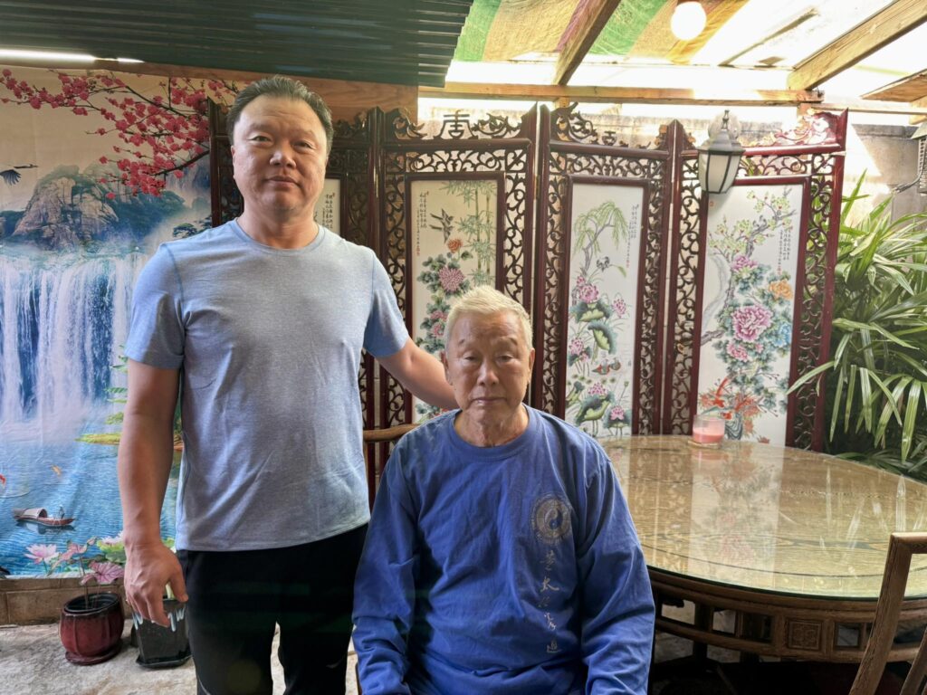 Alex Dong and his father Dong Zeng Chen