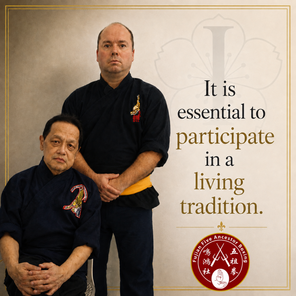 Mark V. Wiley standing with his teacher Sifu Alex Co seated, representing the living transmission of orthodox Ngo Cho Kun