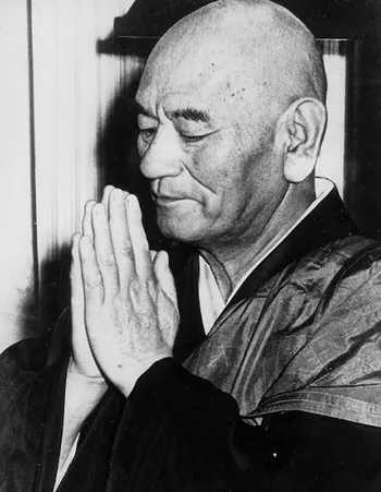 Portrait of Zen teacher Taisen Deshimaru, known for integrating Zen practice and martial arts discipline.