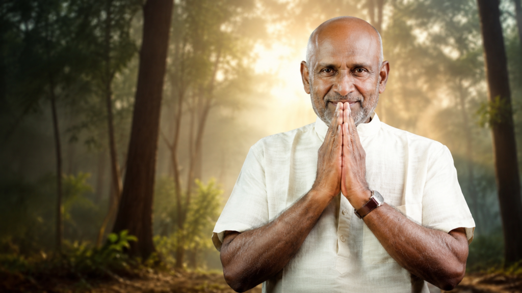 Guru Yogi Shivan demonstrating a traditional namaste gesture while discussing the integration of warrior training and healing traditions.
