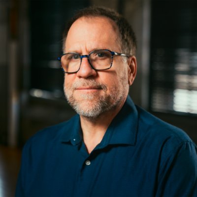 Portrait of cognitive scientist and philosopher Dr. John Vervaeke, whose work explores wisdom, the meaning crisis, embodied cognition, participatory knowing, and human transformation.