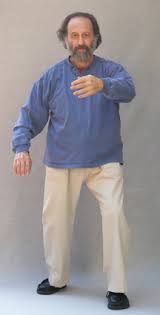 Dr. Robert Chuckrow demonstrating a Tai Chi posture emphasizing relaxation, structure, and internal strength