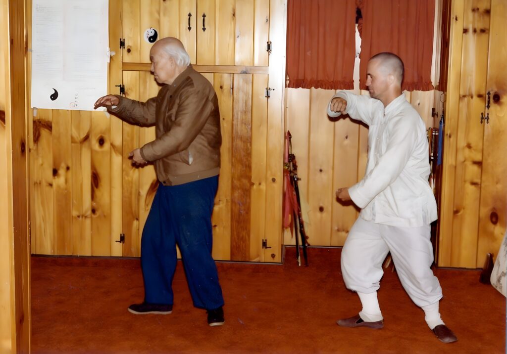 Young Stuart Olson studying Tai Chi with Master T.T. Liang during his early years of training