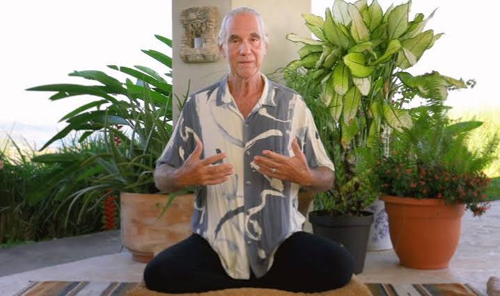 Will Johnson demonstrating Breathing Through the Whole Body embodied meditation through posture, breath, and awareness during a seated meditation practice.