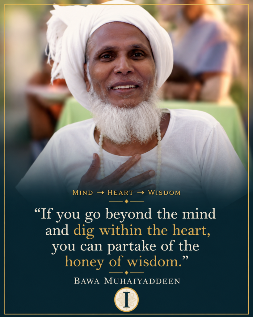 Bawa Muhaiyaddeen with his hand over his heart, illustrating his Sufi teaching on going beyond the mind and discovering wisdom within the heart.