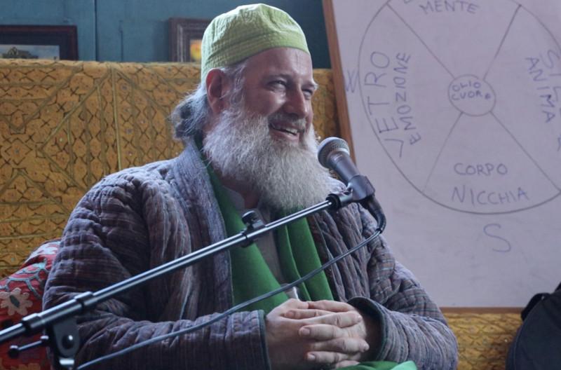 Shaykh Burhanuddin Herrmann seated while teaching on Sufi awareness, remembrance, and the work of the heart.