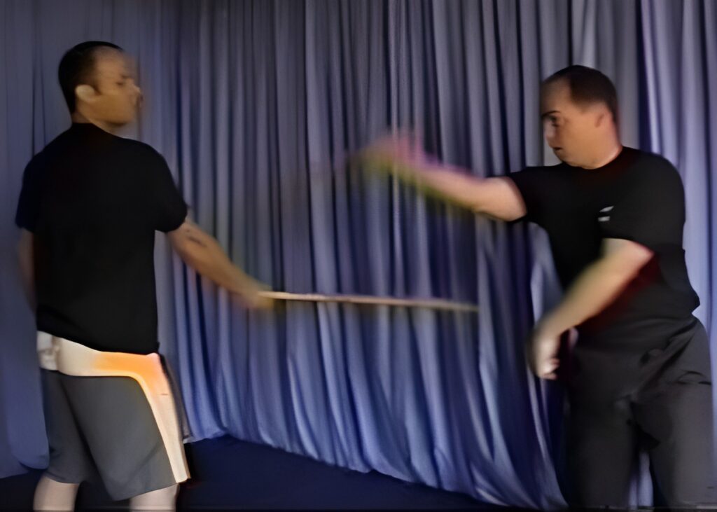 Mark Wiley defending against Alan Orr in Eskrima, demonstrating how the body leads movement from technique toward embodied capacity.