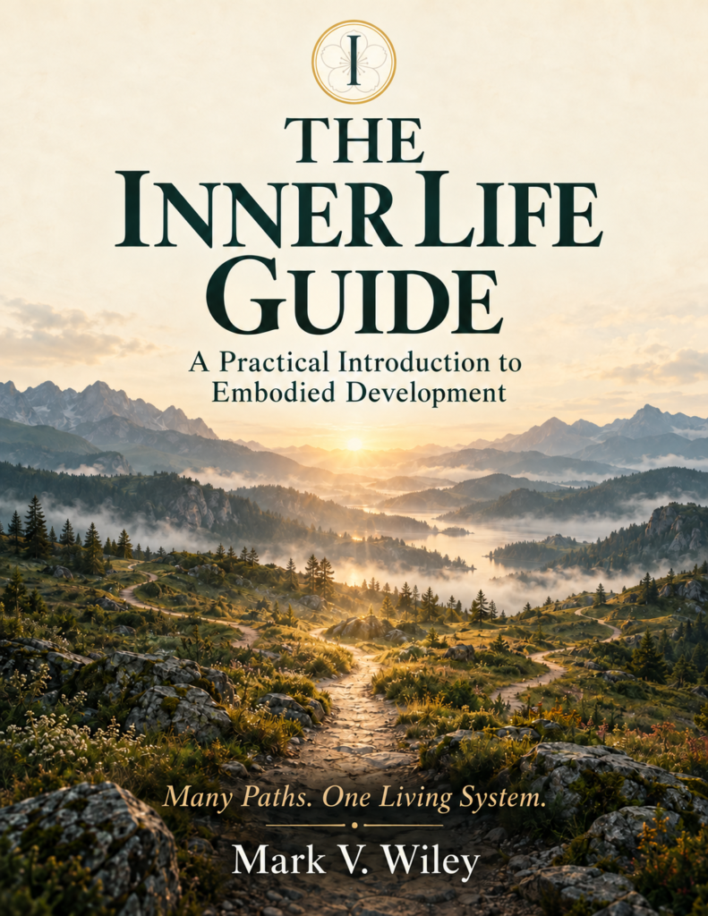 Cover of The Inner Life Guide by Mark V. Wiley, featuring the Inner Life sakura emblem above mountain paths at sunrise.