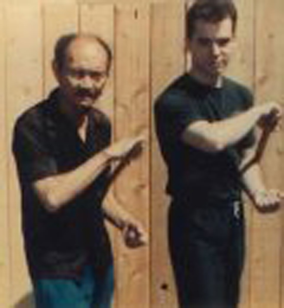 Mark V. Wiley with Escrima master Angel Cabales in 1989.